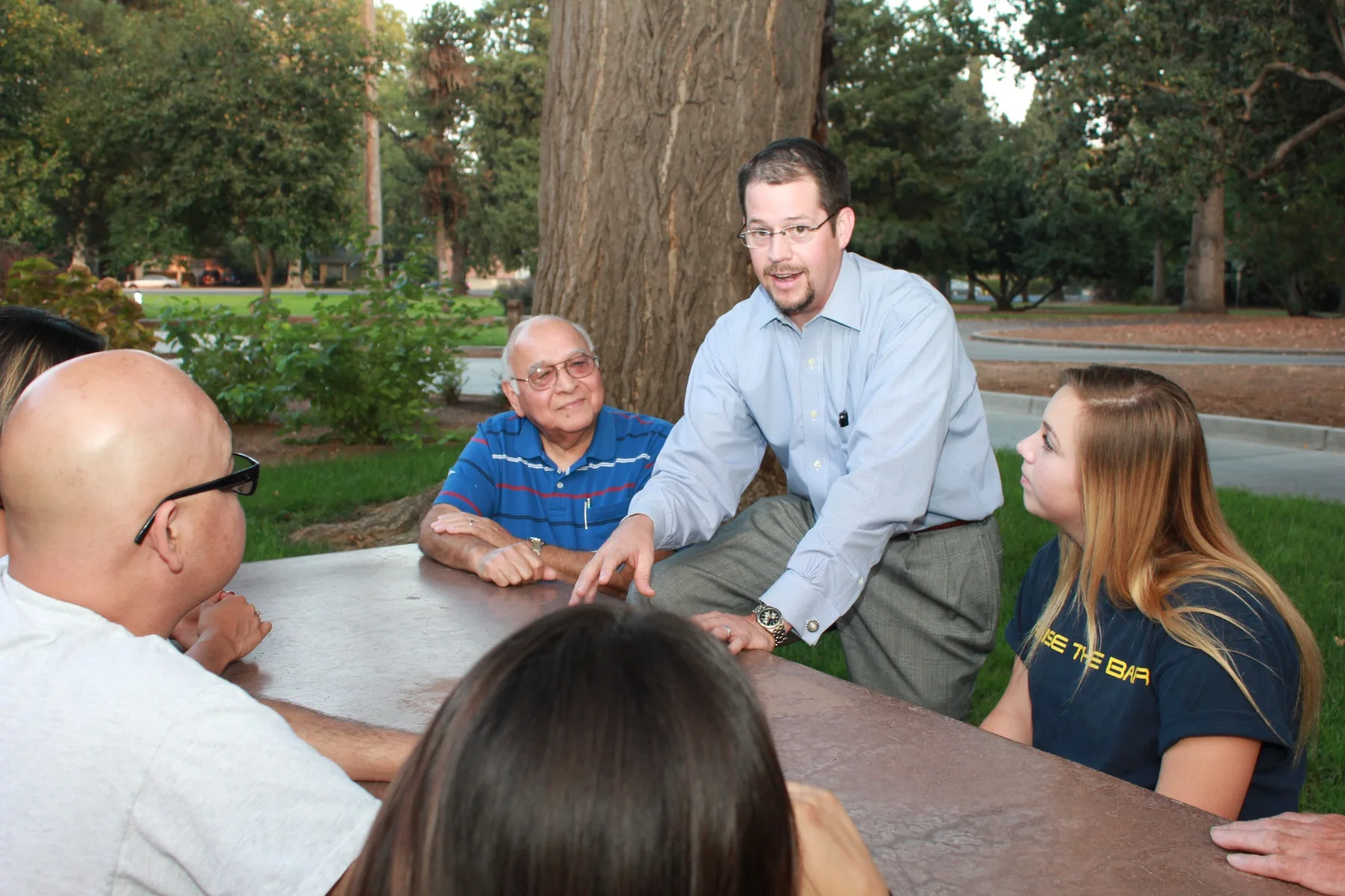 Randall Stone discussing policy directly with community members